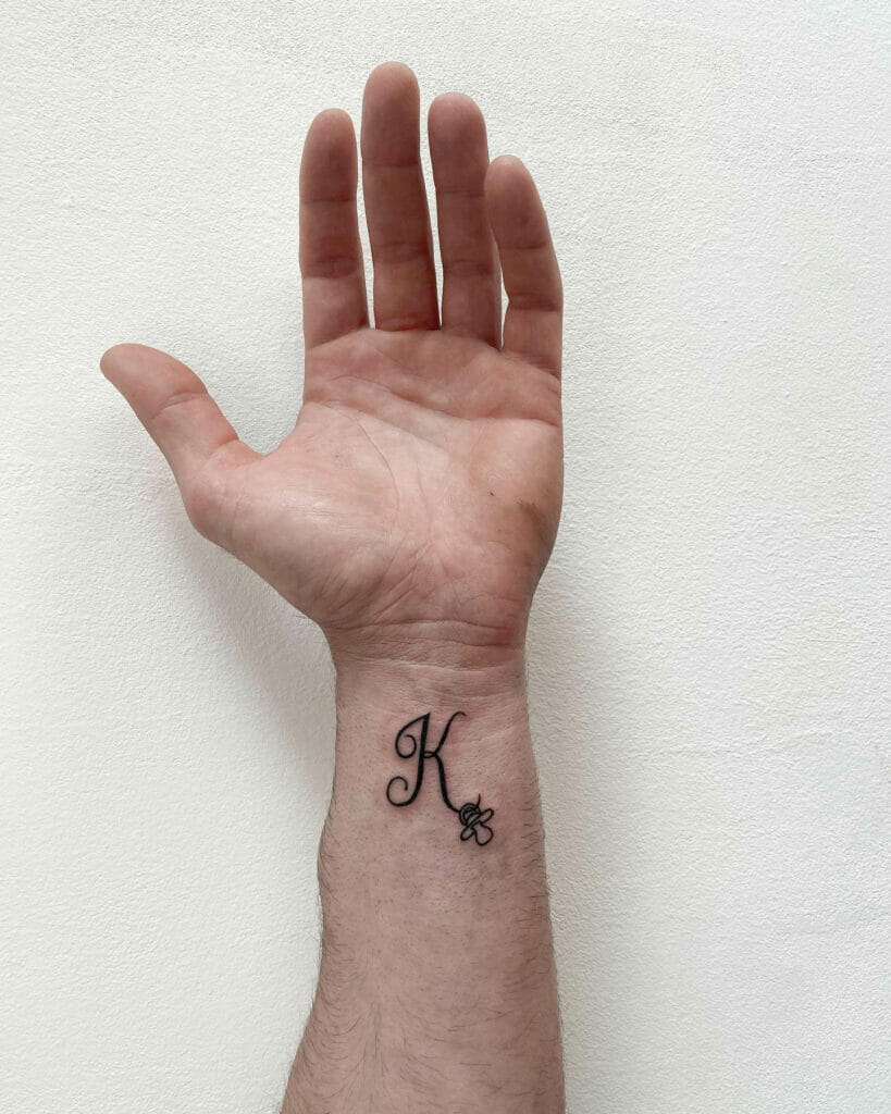 K Wrist Tattoo