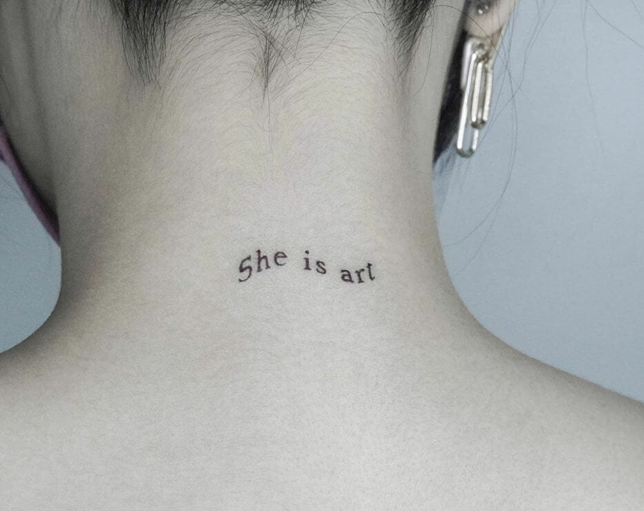 Admiring neck word tattoos for women