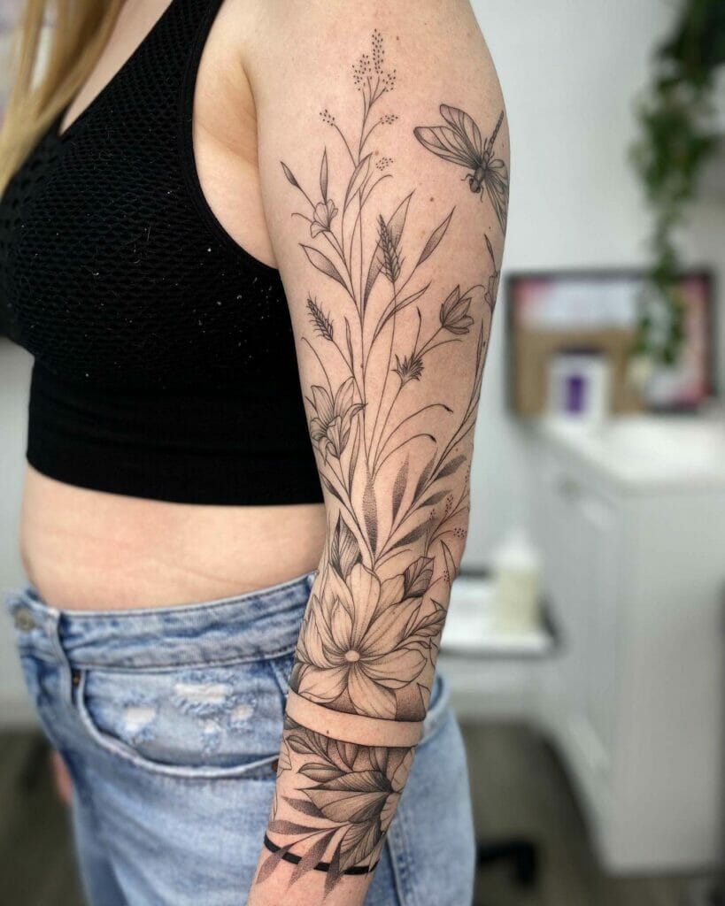 Wild Flower Sleeve Tattoo And Dragon Fly Tattoo