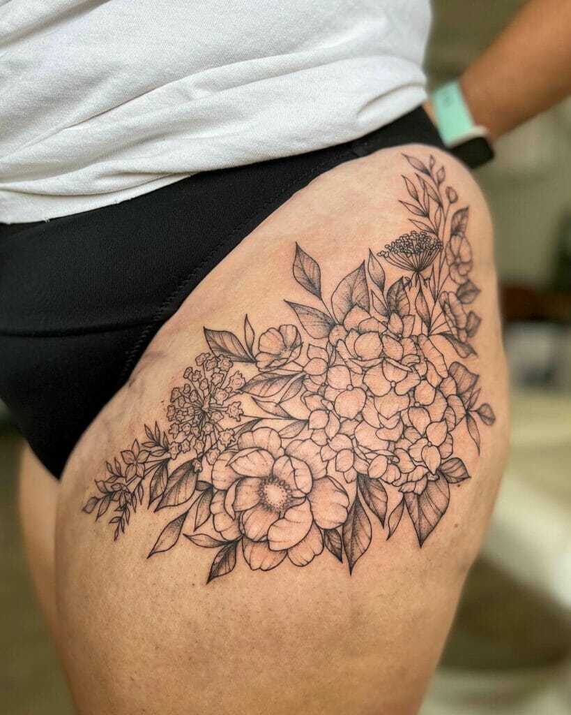The Detailed Floral Bouquet Hip Tattoos