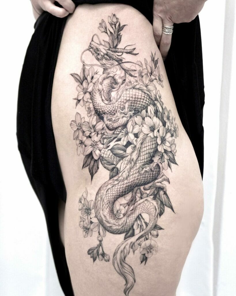 Cherry Blossom Dragon Tattoo On The Thigh