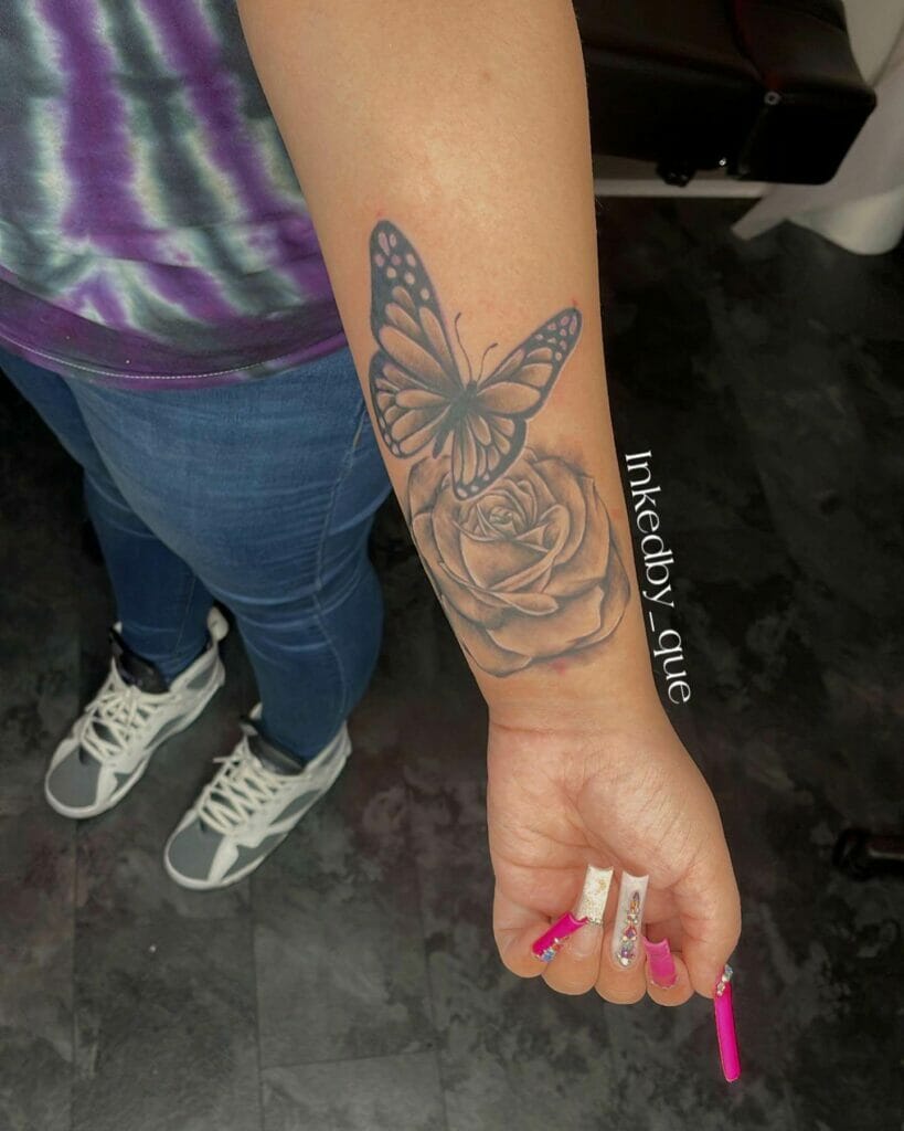 upper arm rose tattoos for women