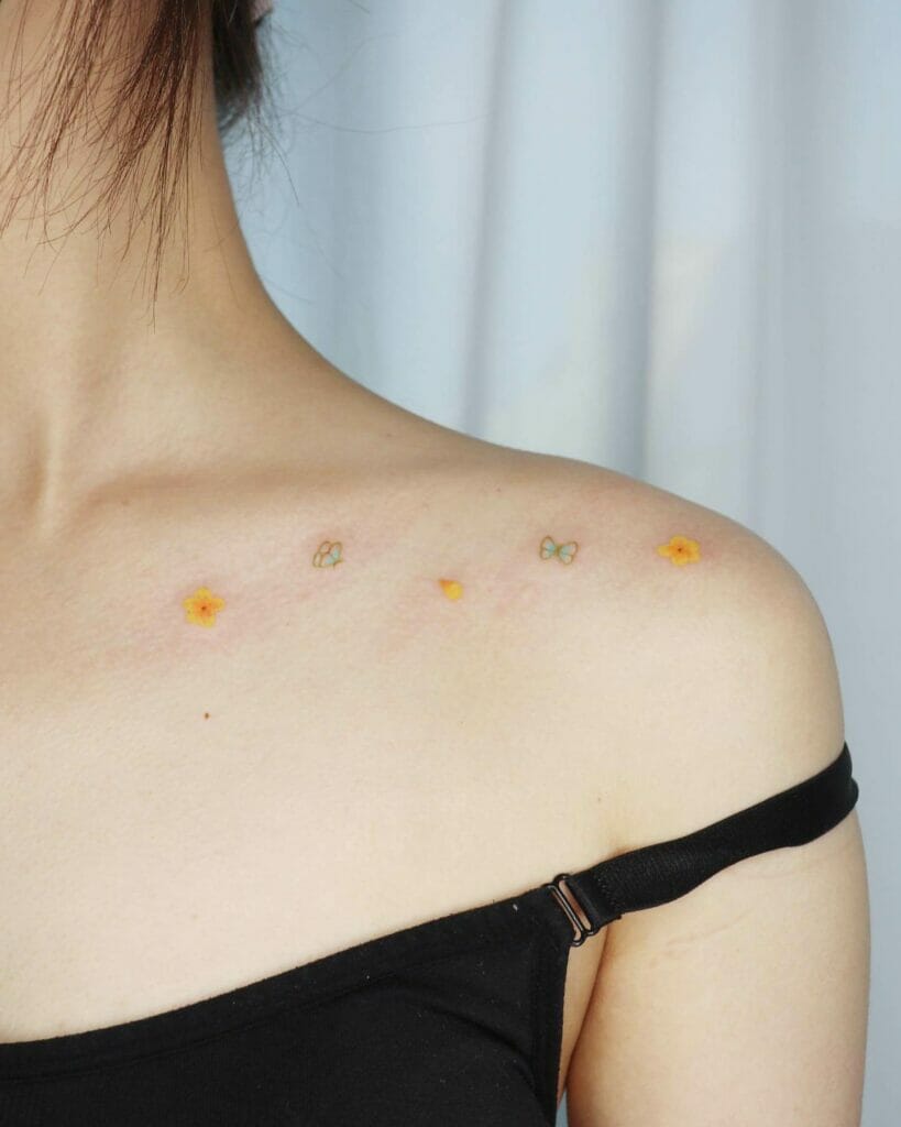 Minimal And Simple Flower Collarbone Tattoos