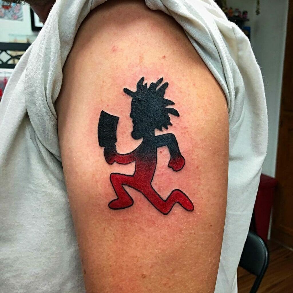Red Ombre Juggalo Hatchet Man Arm Tattoo Design