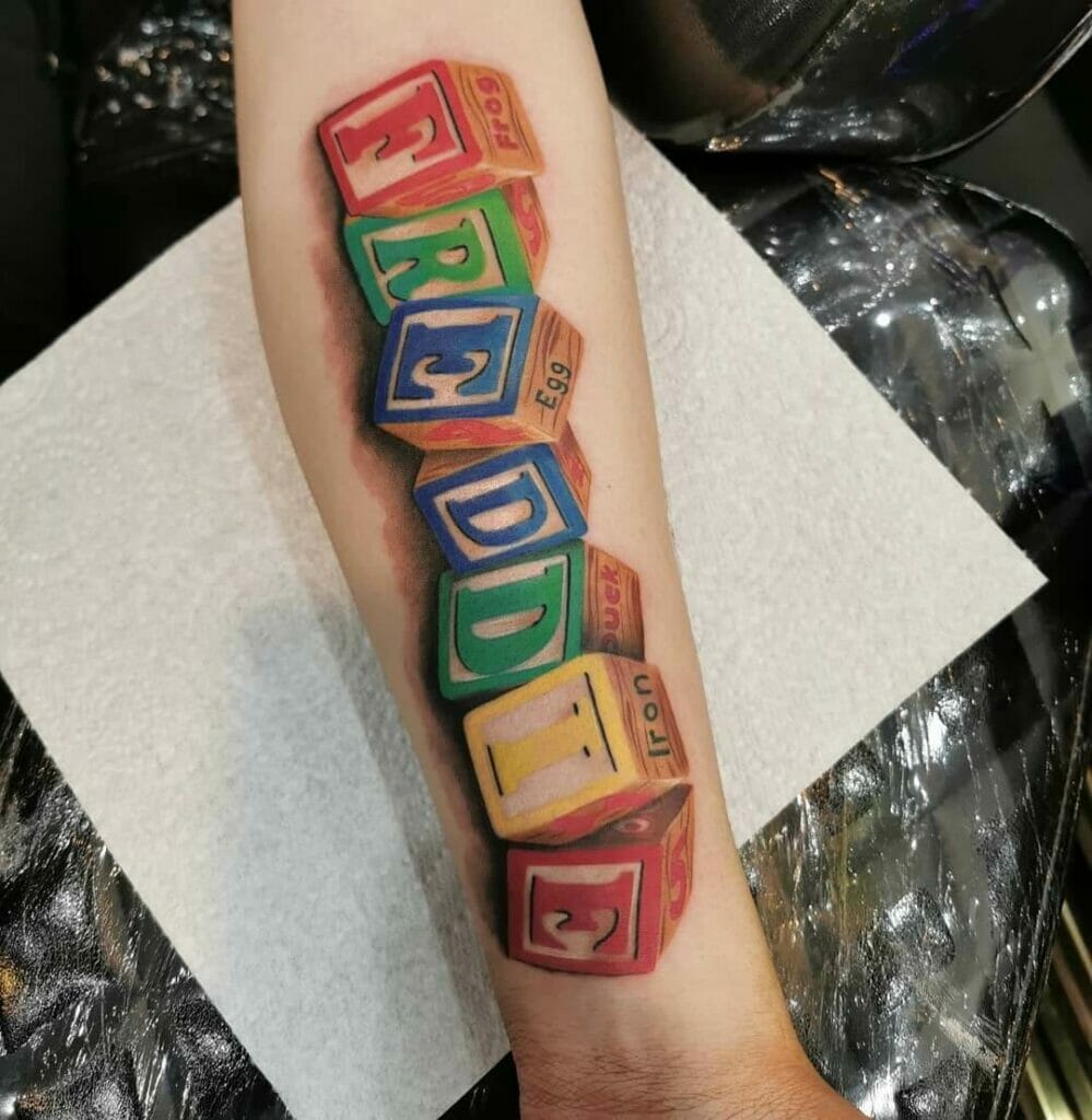 Game Themed Sons Name Tattoo