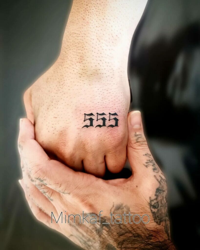Gothic 555 Tattoo On Fist