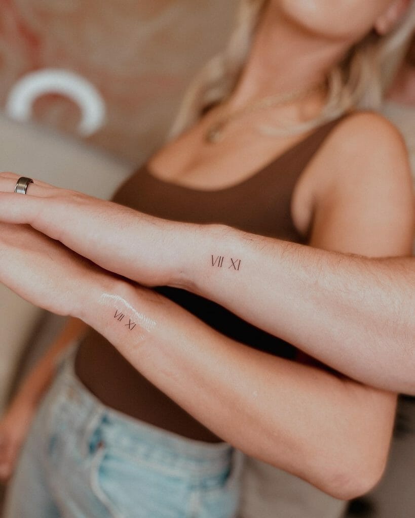 Dainty Roman Numeral Tattoos On Wrists