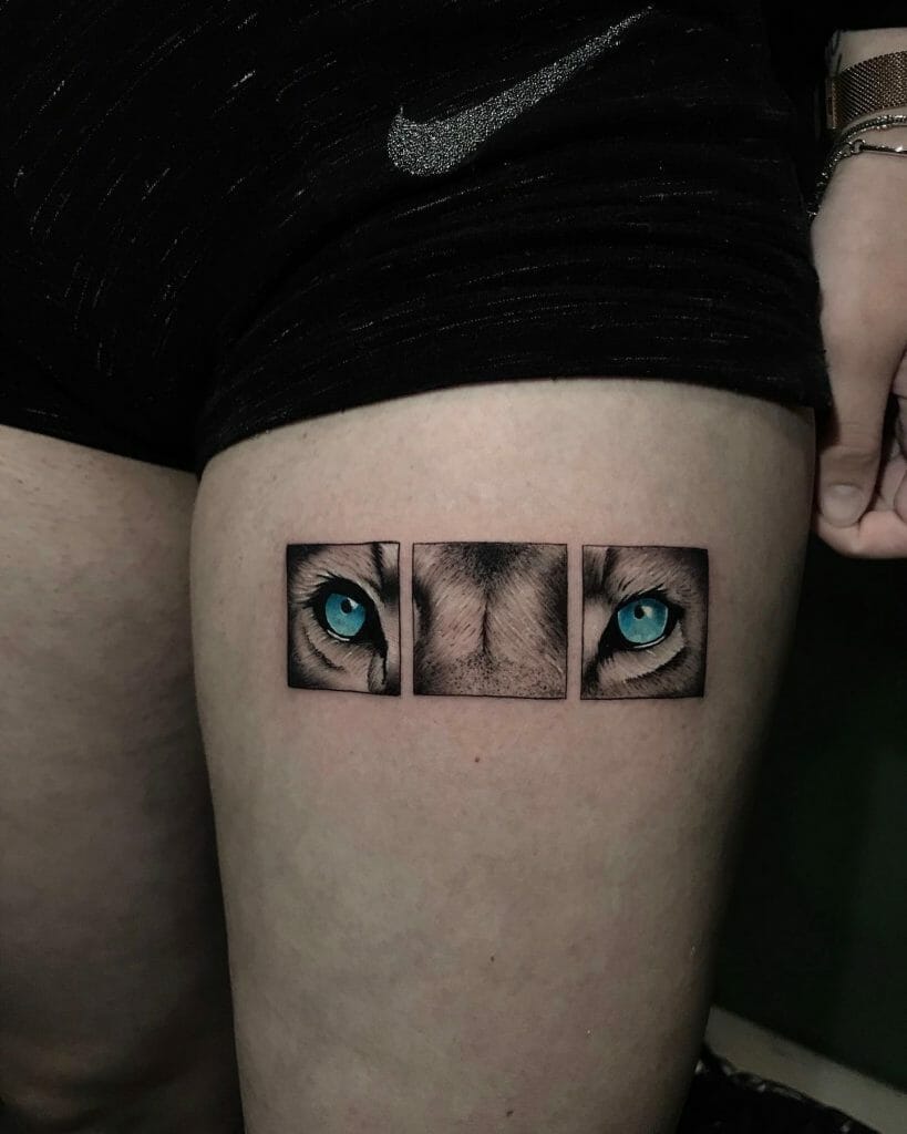 Lion Eyes Tattoo On Thigh