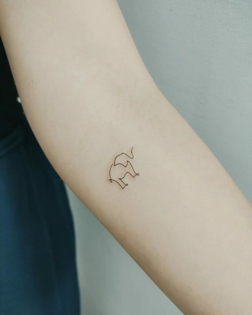 Minimal Feminine Elephant Outline Tattoo