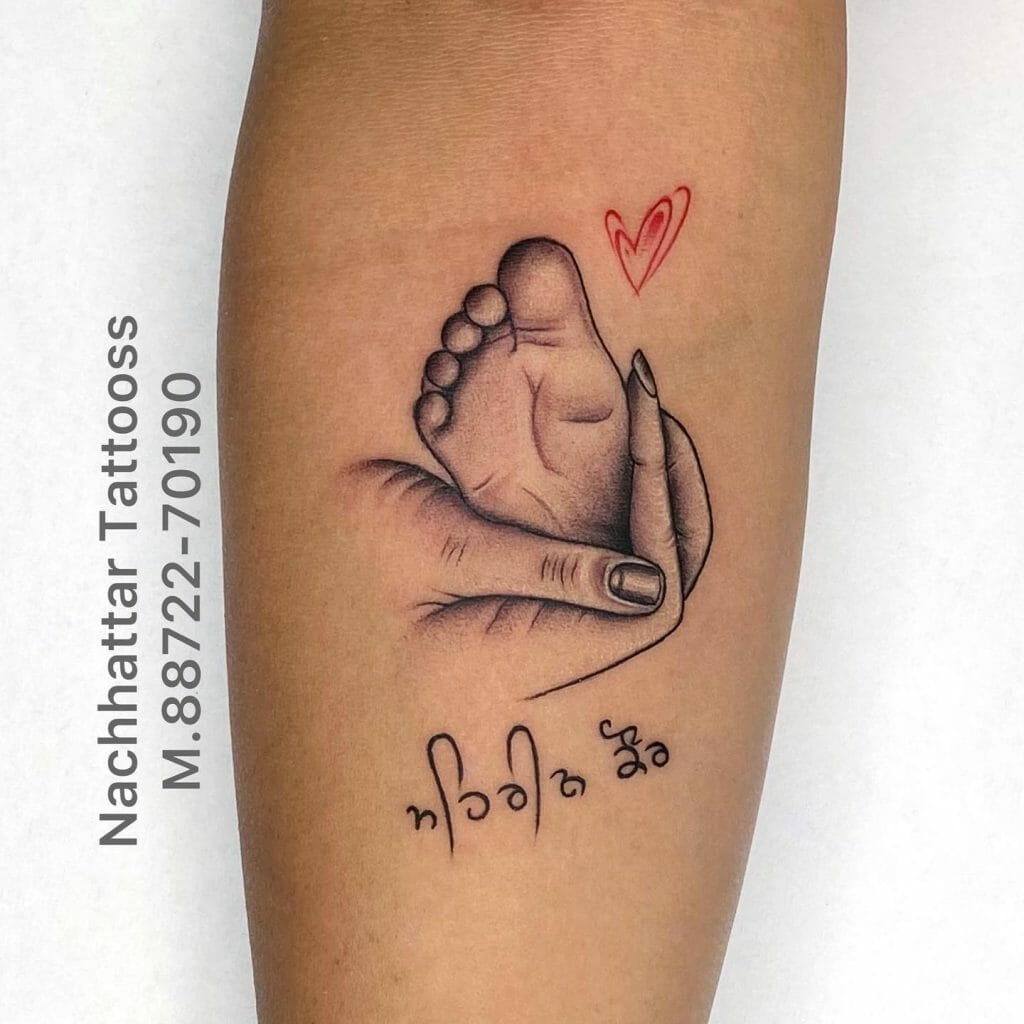 Mother Holding Child's feet Tattoo