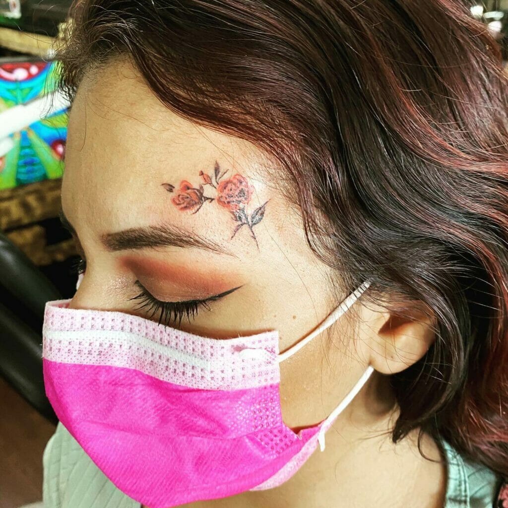 Small Rose Face Tattoo