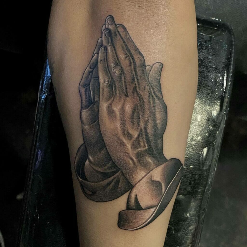 Praying Hands Tattoo in Black Ink