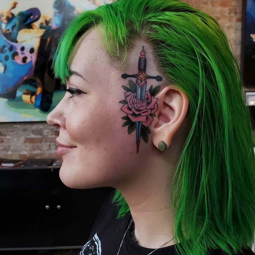 Dagger Through Rose Face Tattoos