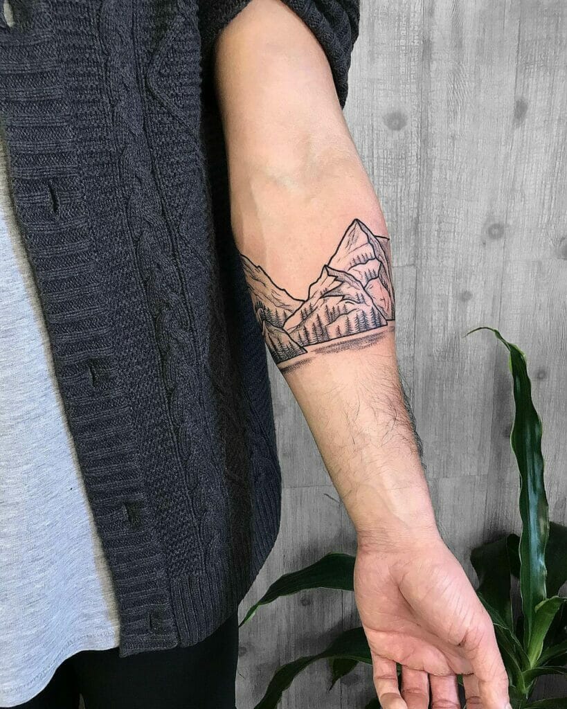 The Majestic Mountains And The Rock Climbing Tattoos Of Grandeur