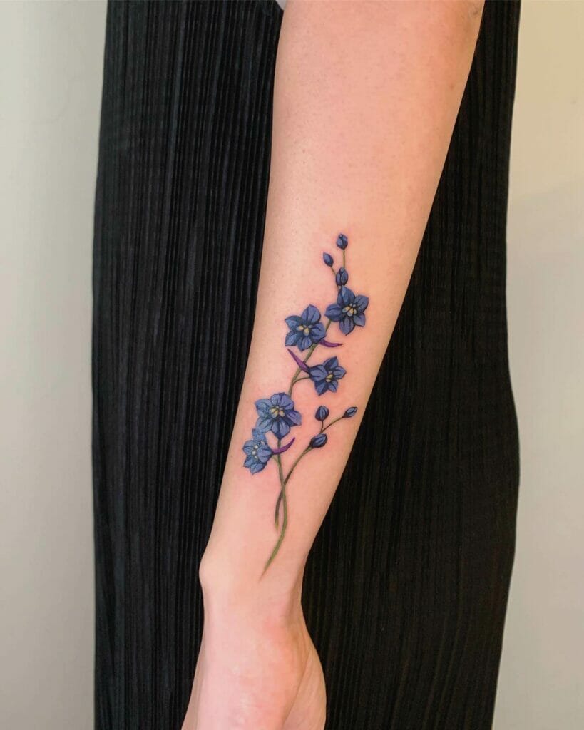 Beautiful Blue Delphinium Flower Tattoo On Wrist
