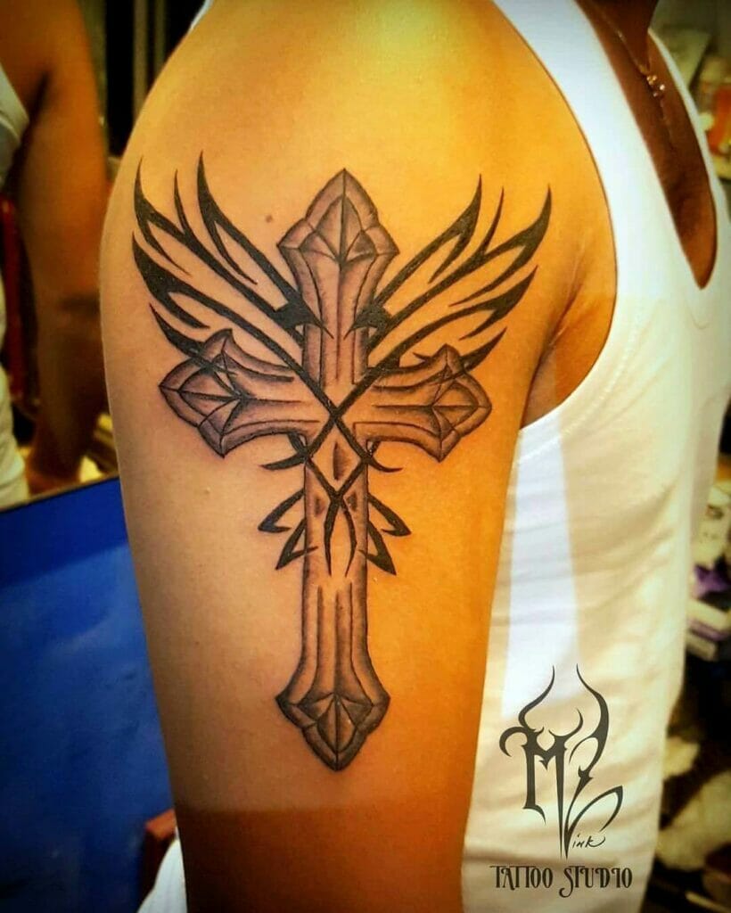 Winged Tribal Cross Tattoo