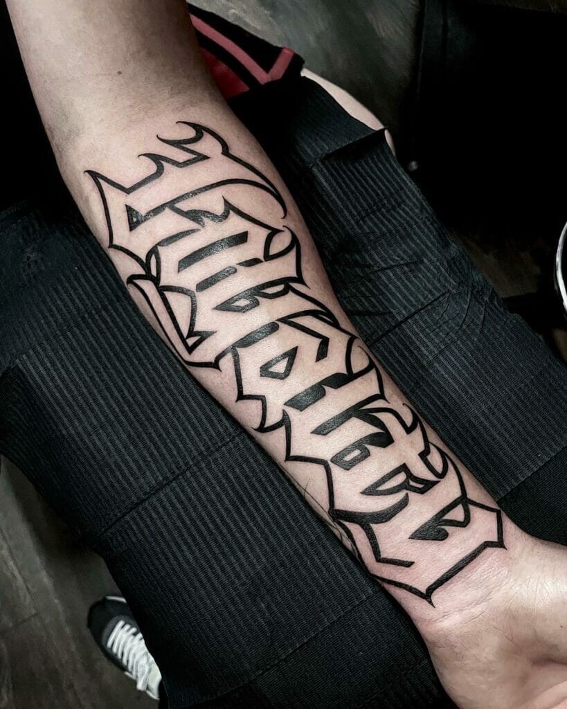 Gangster Font Half Sleeve Loyalty Tattoo On Arm