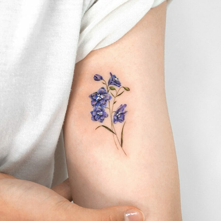 Gorgeous Upper Arm Delphinium Flower Tattoo