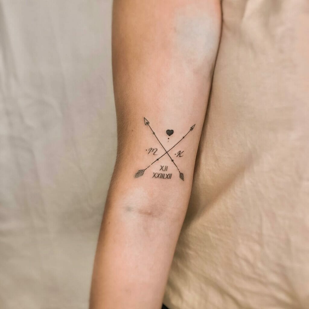 Female Crossed Arrow Tattoo