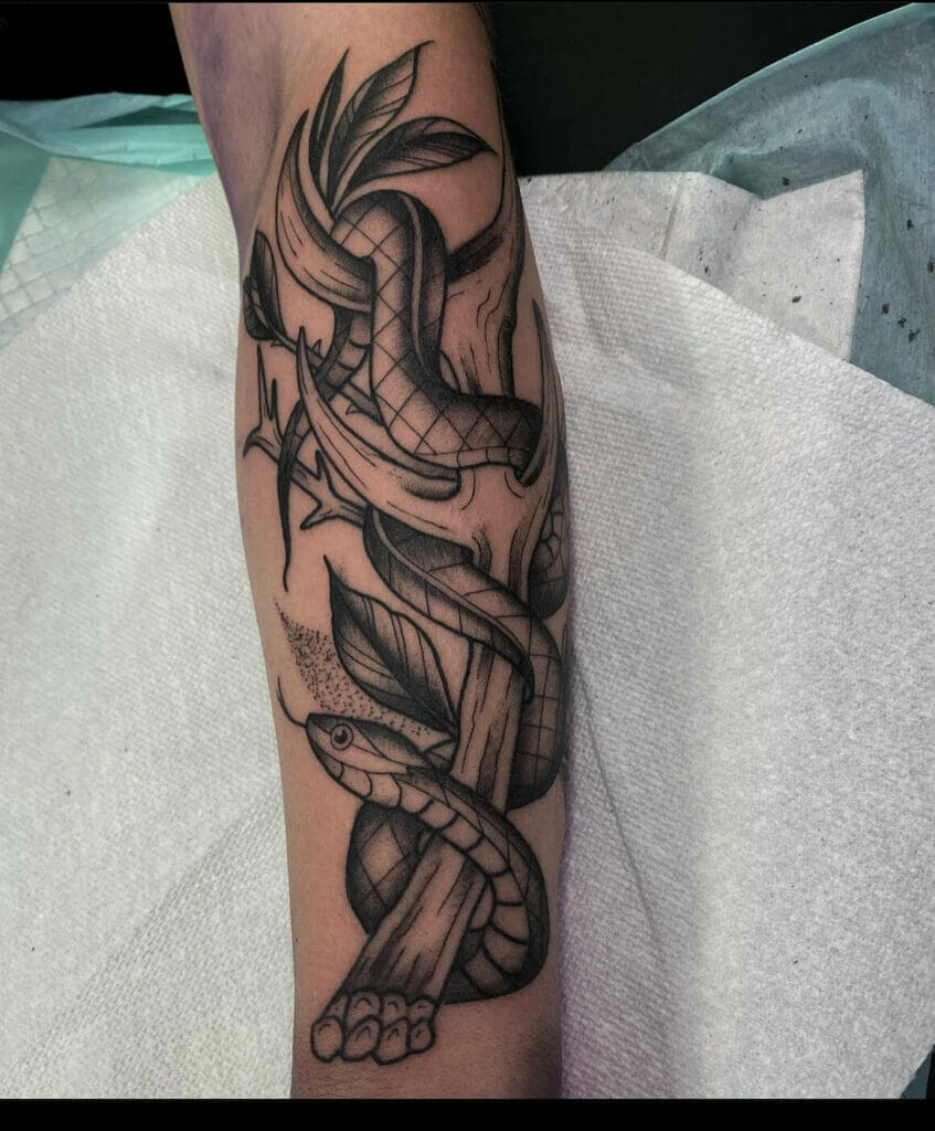 Snake And Deer Antler Tattoo