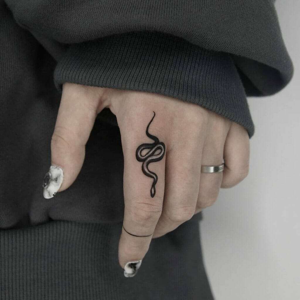 Black And White Elegant Finger Snake Tattoo