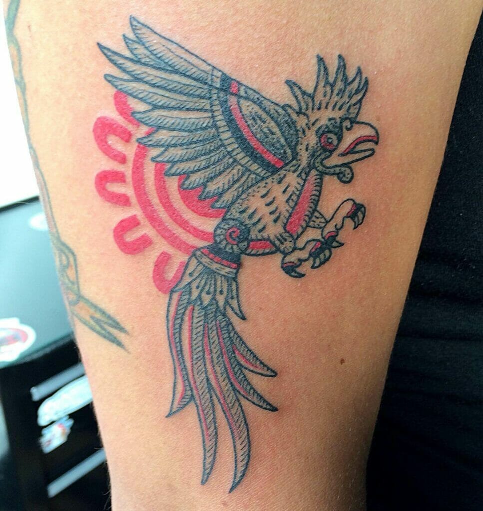 Ravishing Black And Red Quetzal Tattoo
