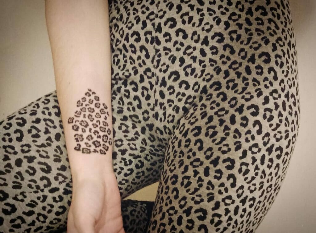 Small Cheetah Print Tattoo on Wrist Ideas