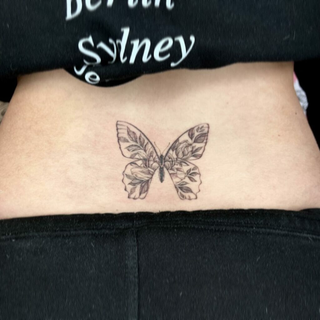 Minimalistic Butterfly Tattoo Lower Back