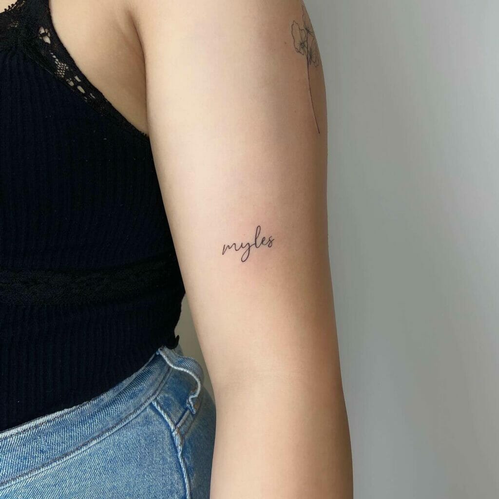 Fine Line Name Tattoo