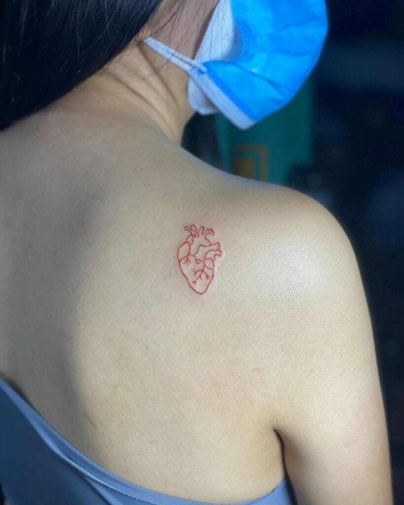 Minimalist Red Heart Tattoo