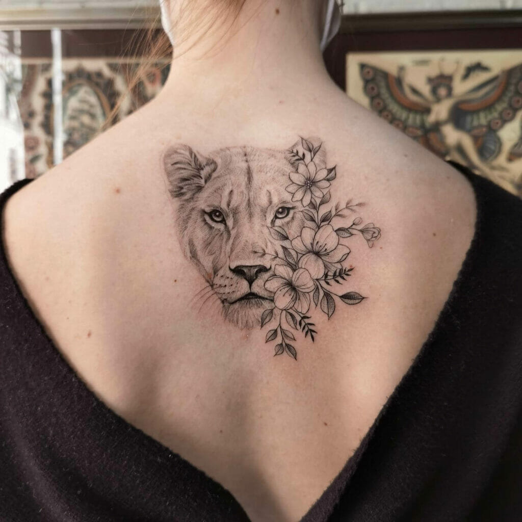 Delphinium And Lioness Tattoo