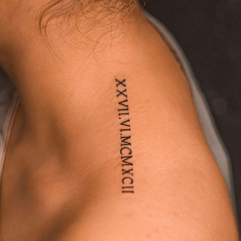Shoulder Tattoo With Roman Numerals