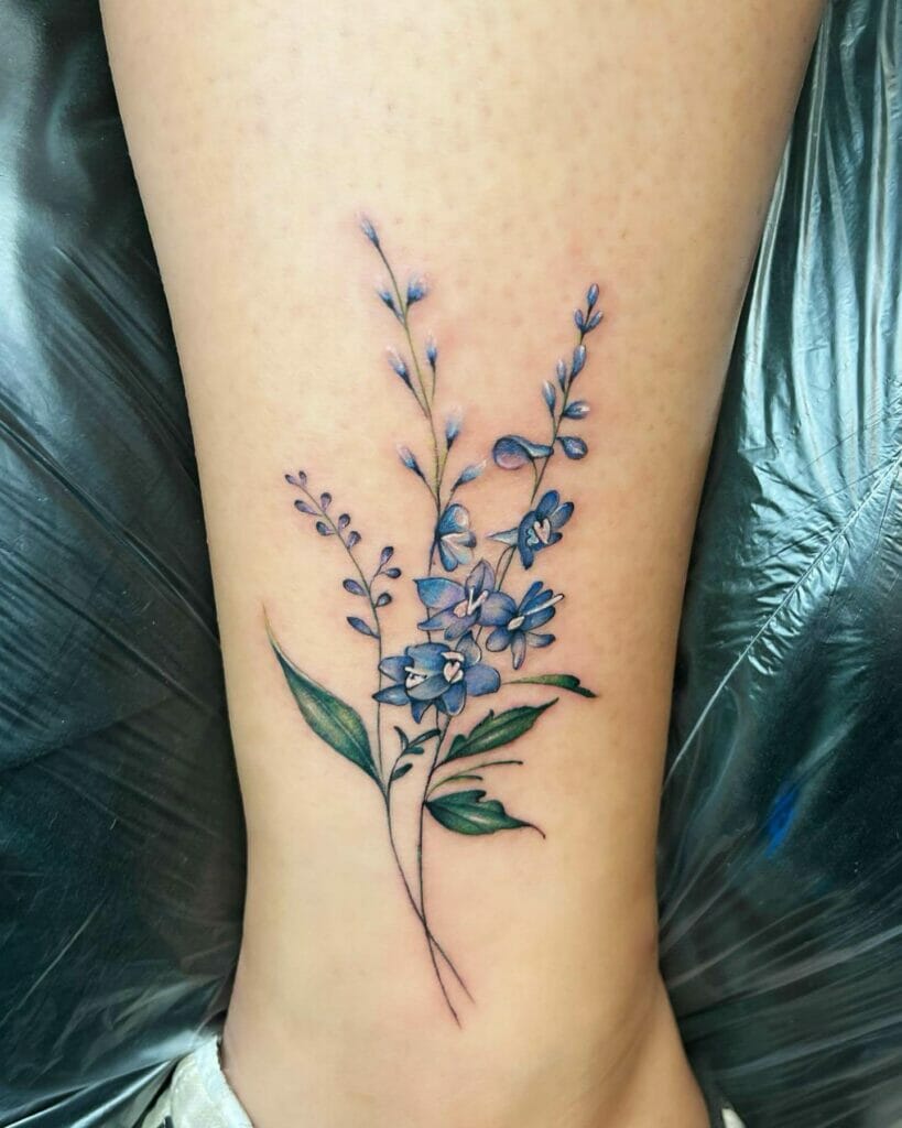 Beautiful Blue Color Simple Delphinium Tattoo