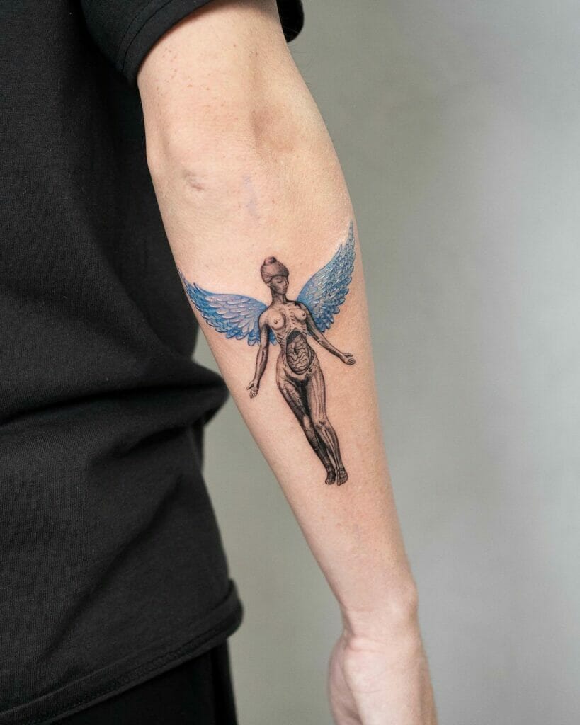 In Utero Blue Wings Tattoo 