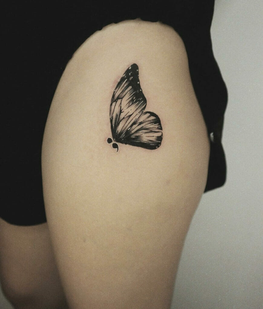Semicolon Butterfly On Thigh Tattoo