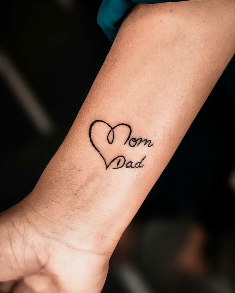 Adorable Mom And Dad Lettering Tattoo