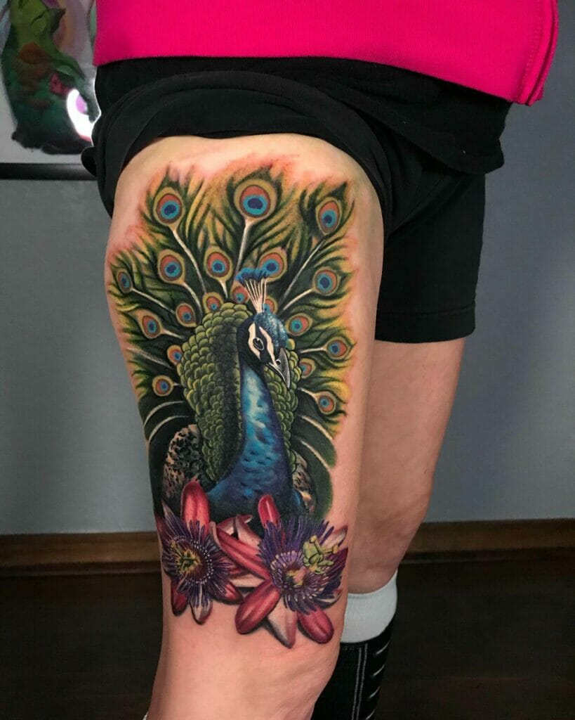 Vibrant Peacock Thigh Tattoo