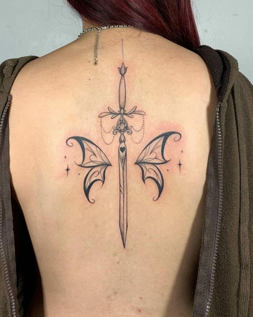 The Sword Butterfly Spine Tattoo