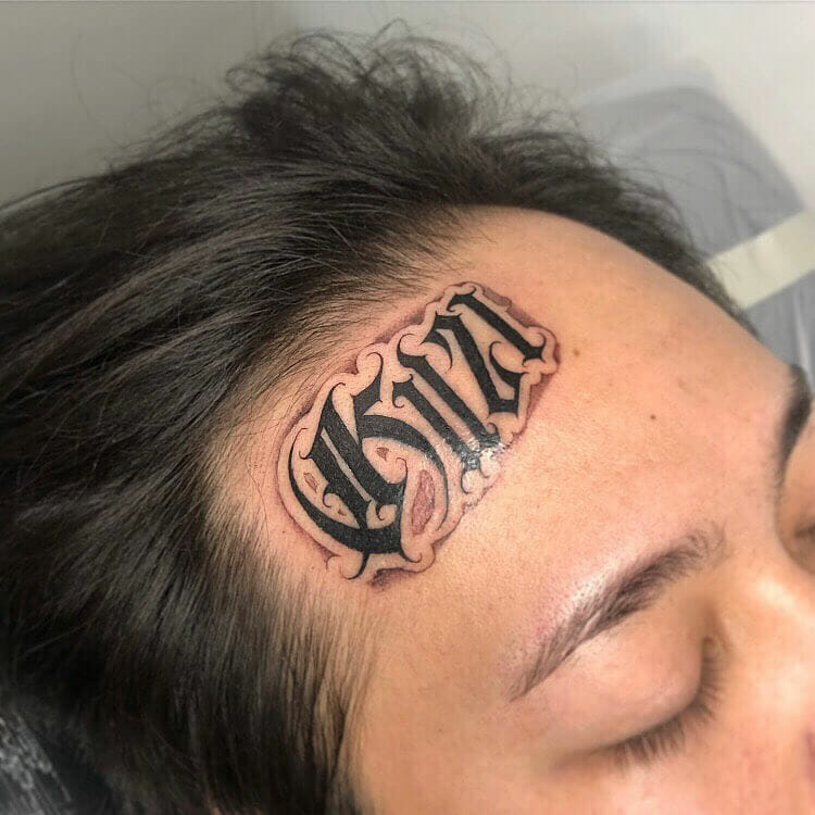 Chicano Lettering Face Tattoo