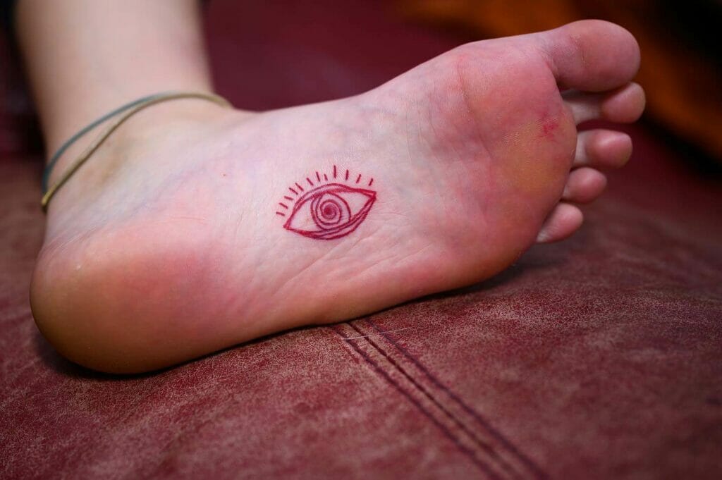 Trippy Red Eye Tattoo Bottom Of Foot