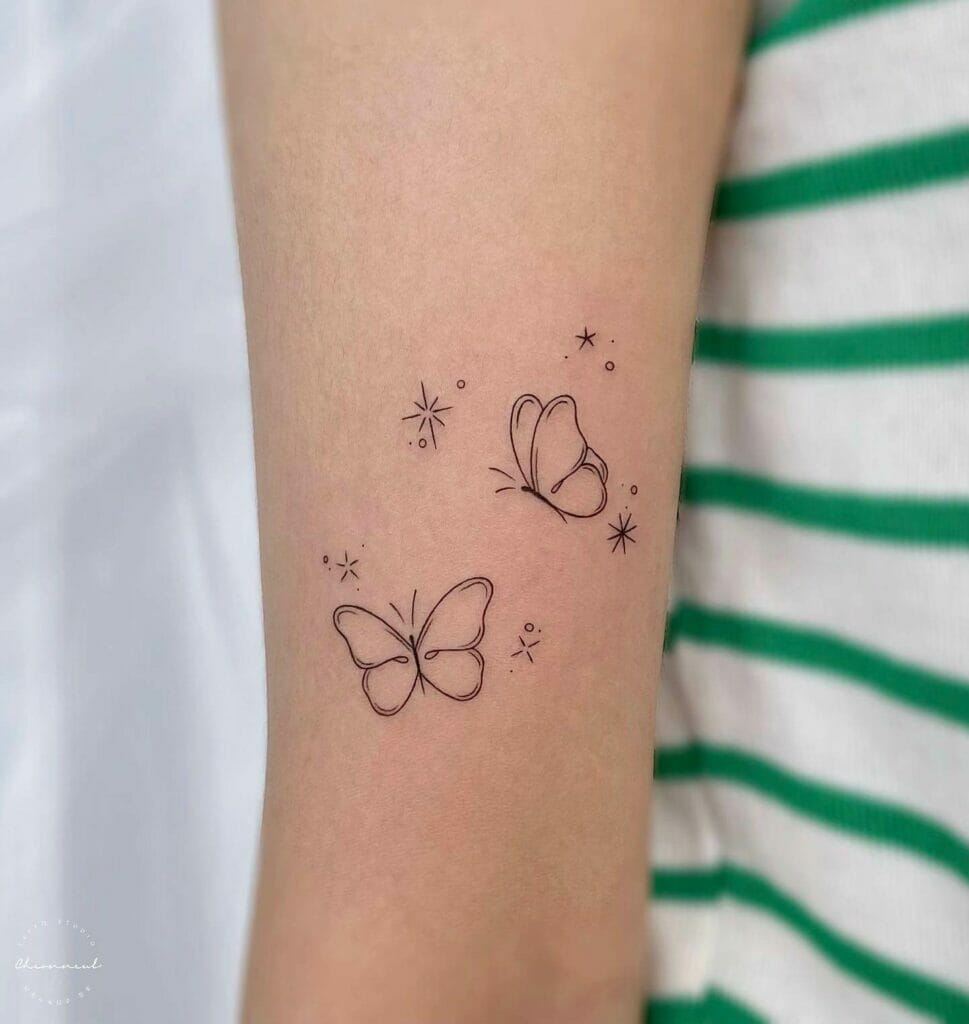 Wrist Nautical Star Tattoo With Butterfly Tattoo On Wrist