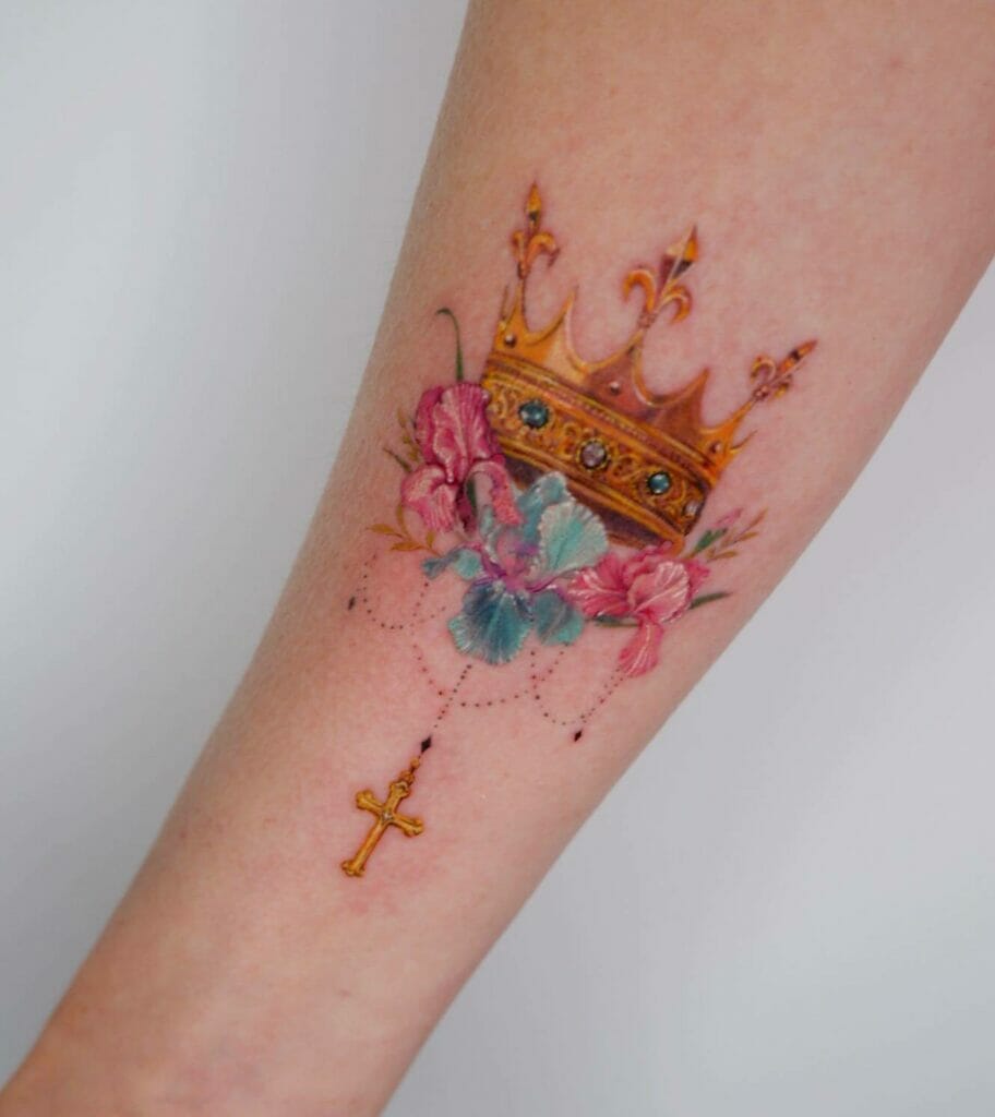 Pink And Blue Flower Bed Crown Tattoo