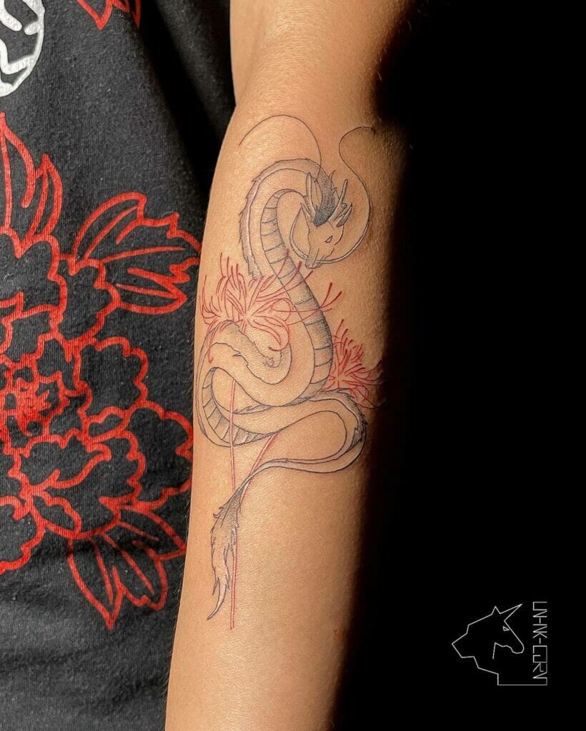 The Chinese Dragon Tattoo With Red Flowers