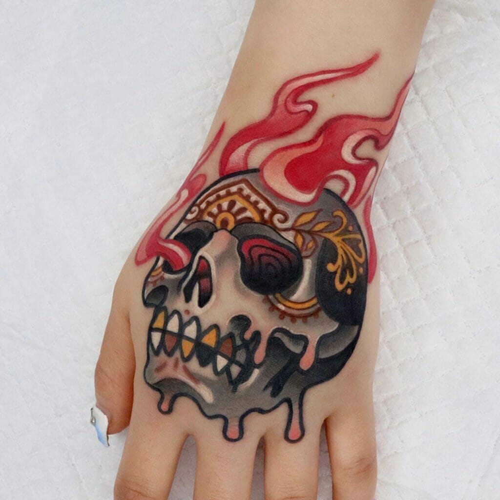 Black Skull Tattoo On The Back Of Hand