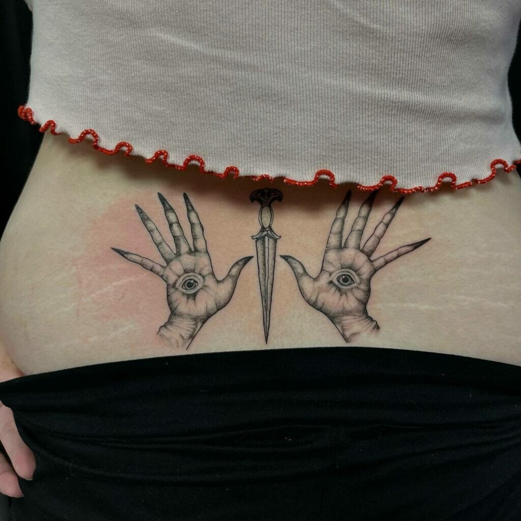 Hands And Dagger Tattoo Design