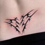 Feminine Lower Back Tattoo
