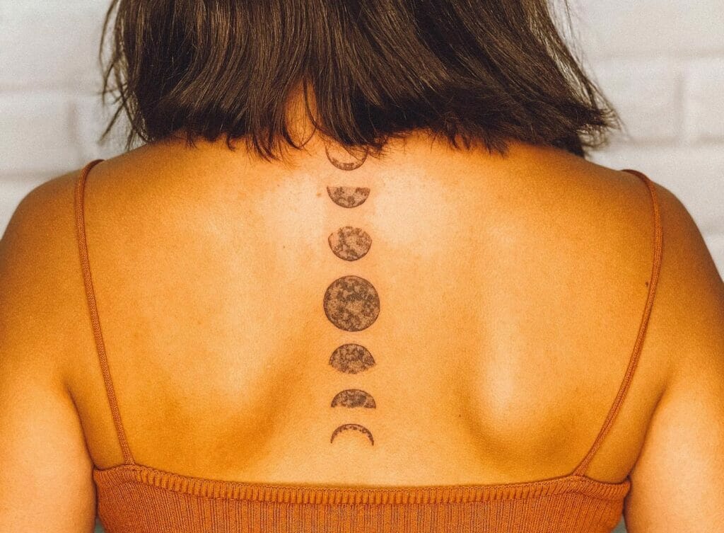 Spine Moon Phases Tattoo