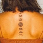 Spine Moon Phases Tattoo