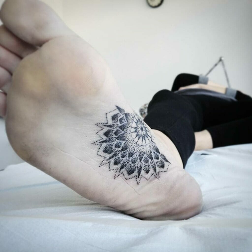 Elegant Mandala Tattoo On The Bottom Of The Foot
