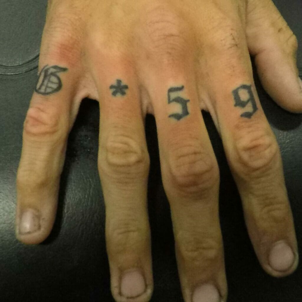 G59 Lettering Finger Tattoo